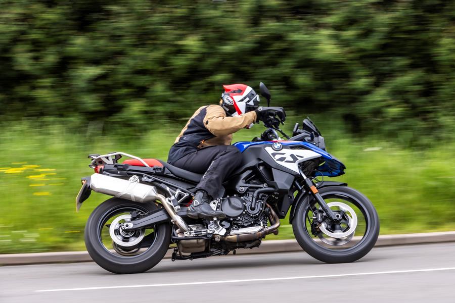 2024 BMW F800GS riding leaning into a corner