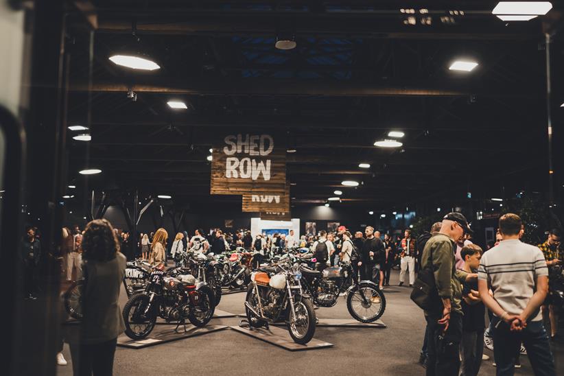 Crowds looking at custom motorrcycles