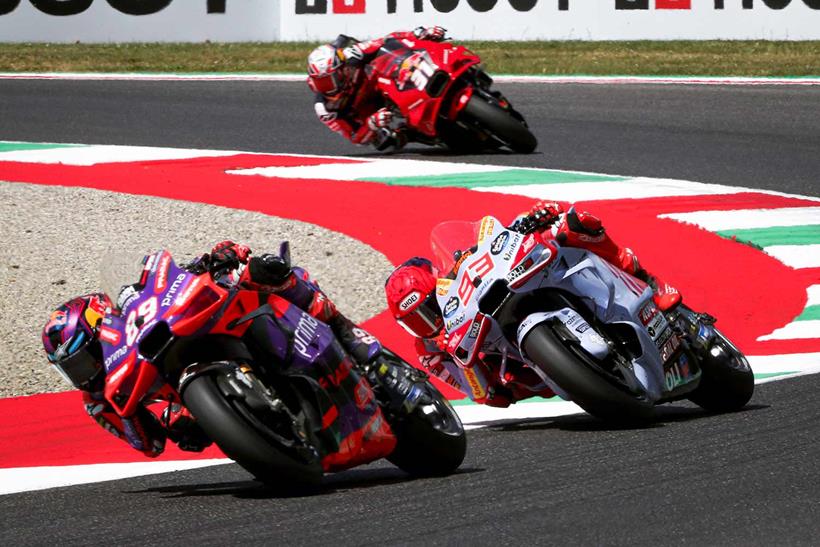 Marc Marquez chases down Jorge Martin during the sprint at Mugello