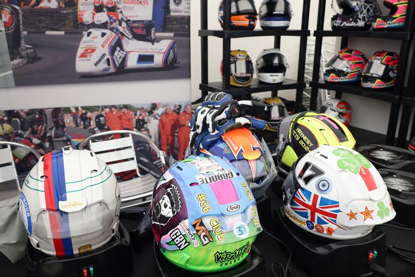 A selection of Arai lids at the 2024 Isle of Man TT