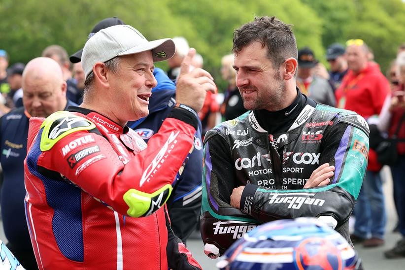 John McGuinness chatting with Michael Dunlop