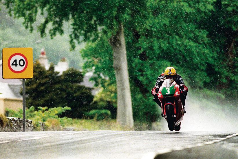 Joey Dunlop riding in the wet at the Isle of Man TT