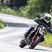 2024 Ducati Hypermotard 698 Mono RVE cornering on a country road