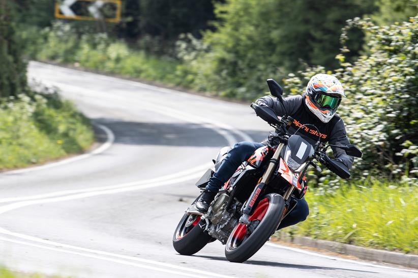 2024 Ducati Hypermotard 698 Mono RVE cornering on a country road