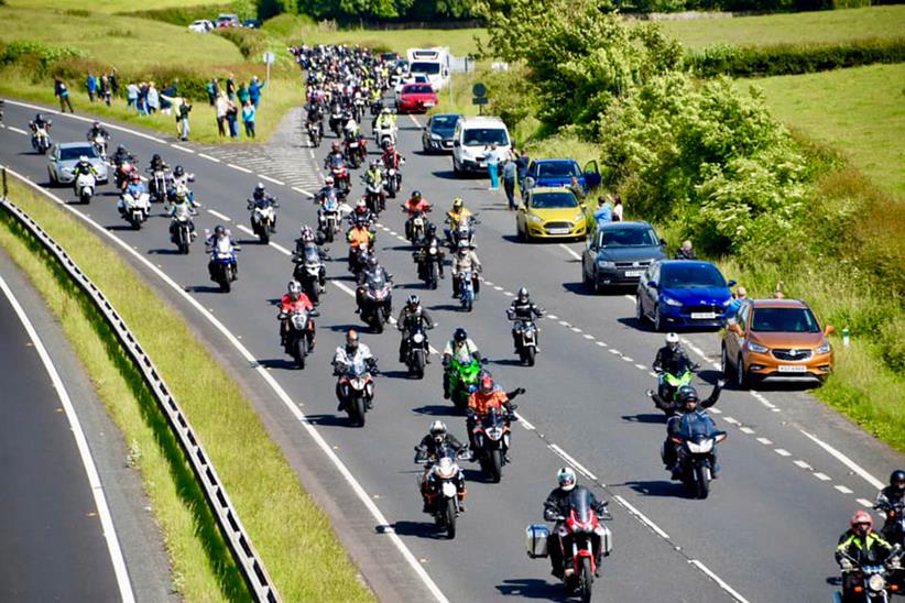 Huge motorcycle procession moves along dual carriageway - Credit Alex Gibson