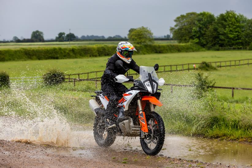 KTM 890 Adventure R rides through muddle puddle