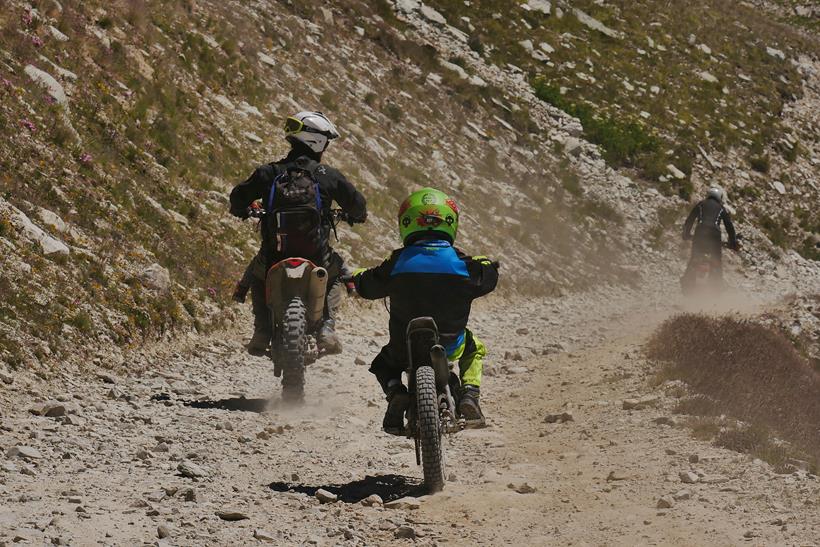 A family ascending the Colle del Sommeiller at the Stella Alpina rally