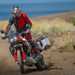 Ducati rider sliding the DesertX Discovery off-road