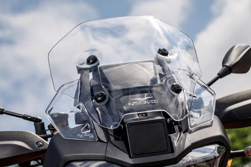 Detailed shot of the 2024 Moto Guzzi Stelvio's electronically adjustable screen 