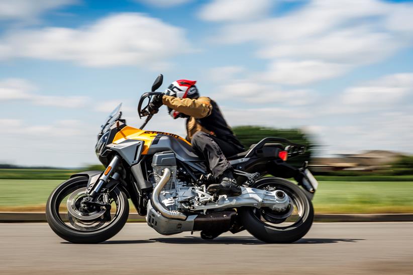 2024 Moto Guzzi Stelvio riding by leaning into a corner