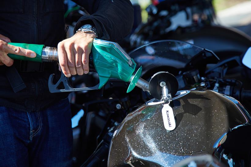 Filling up a bike with petrol