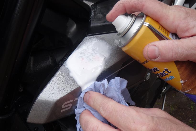 Using furniture polish to clean a motorcycle