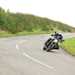 2024 Yamaha Mt-09 SP taking a bend on a country road