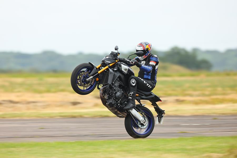 2024 Yamaha MT-09 SP pulling a wheelie