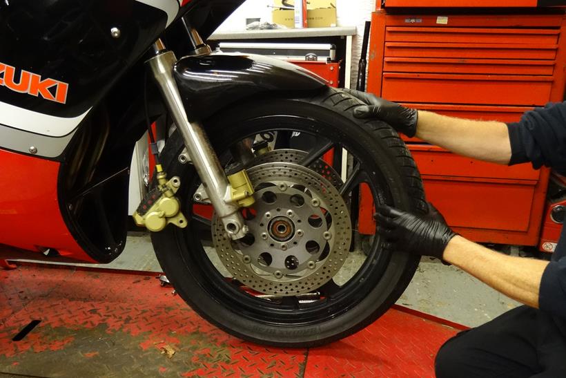 Removing the front wheel of a motorcycle