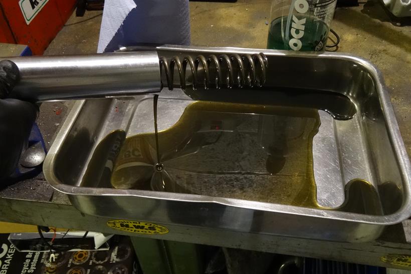 Draining motorcycle fork oil