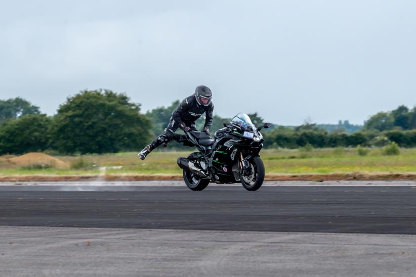 Leaping back onto a Kawasaki Ninja H2 SX. Credit: Steve McDonald Photography