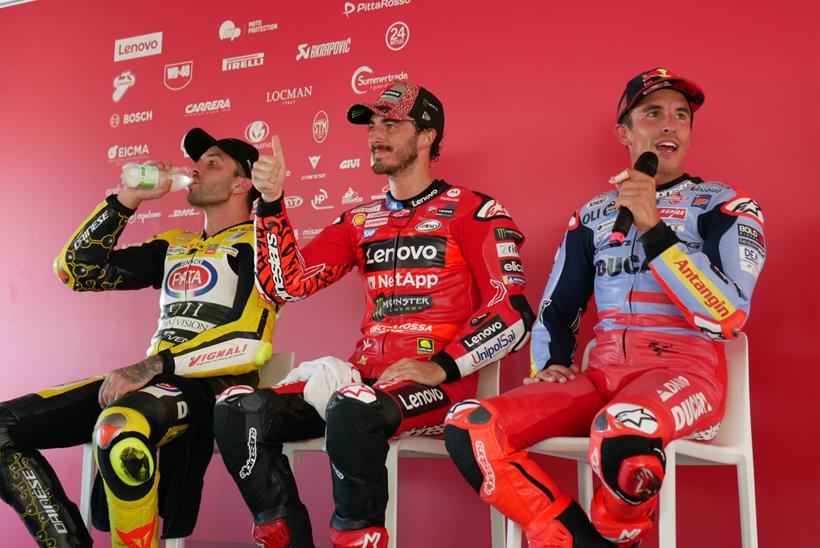 Right: Marc Márquez, middle: Francesco Bagnaia, left: Andrea Iannone during post race conference 