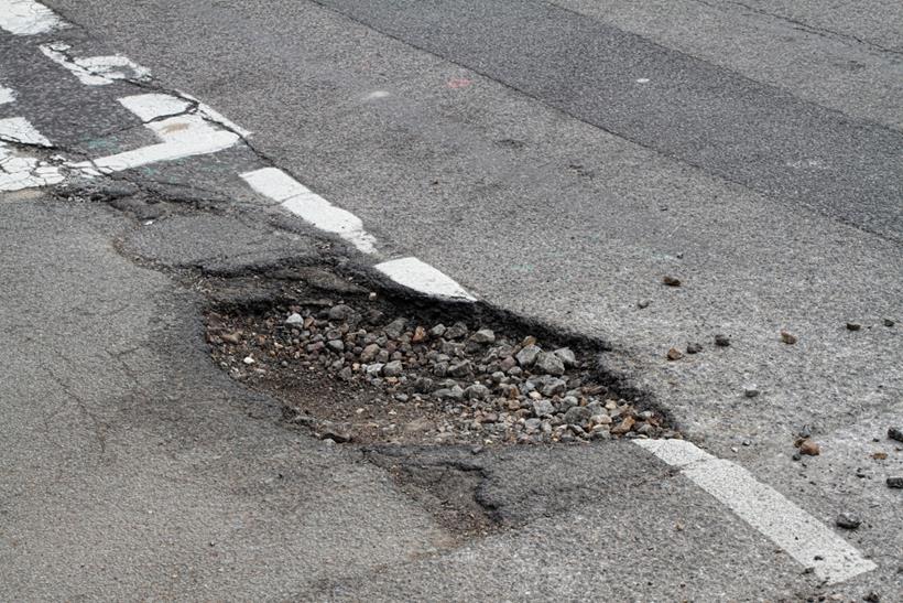 Large pothole on road