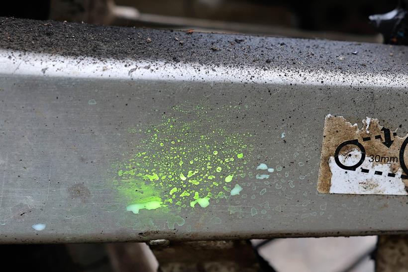 DNA police spray residue on a motorbike