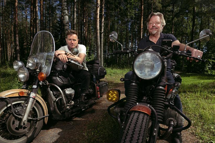 Ewan McGregor and Charley Boorman sit on classic motorcycles