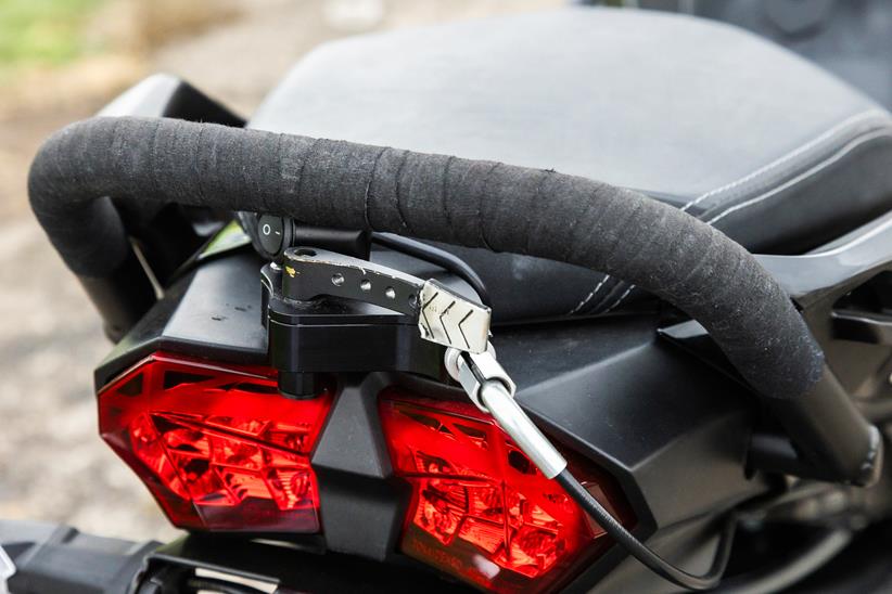 A secondary thumb throttle on the rear of the Kawasaki Ninja H2 SX