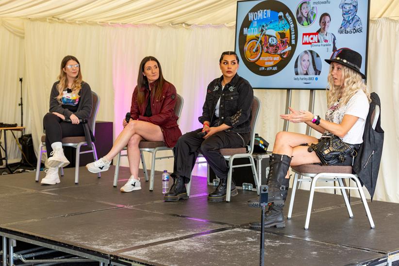 Women in Moto panel on stage