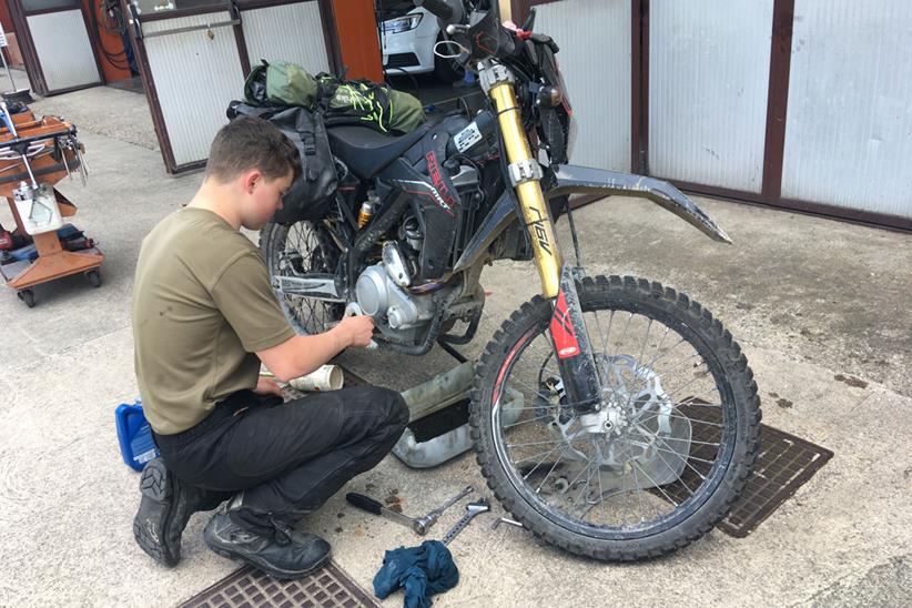 Luke Blackley working on his Rieju