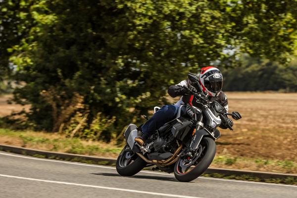 2024-on CFMoto 450NK riding on a country road