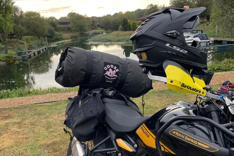 Wingman of The Road Goose tent packed onto the back of a motorcycle