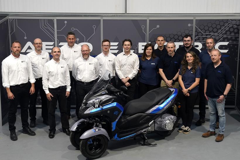 The team from WMC and Mahle pose with the WMC300E+