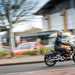 Urban motorcyclist riding through town