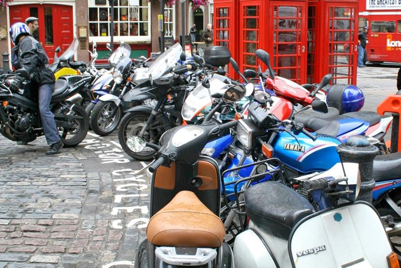 Motorcycles and scooters parked up