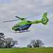 Air Ambulance helicopter landing on grass