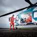 Air Ambulance team standing in and out of the helicopter