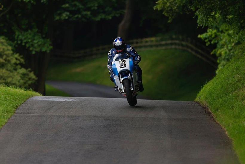 Dave Suddes riding on a road racing course