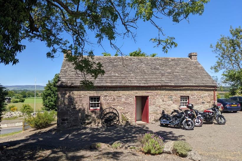 Harley-Davidson motorcycles parked outside the 'Davidson' cottage