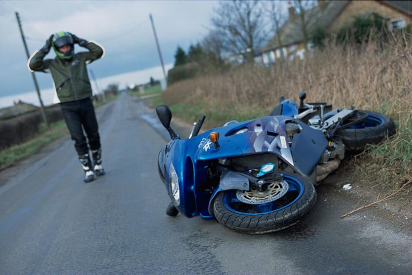 Motorcyclists reacting to crash