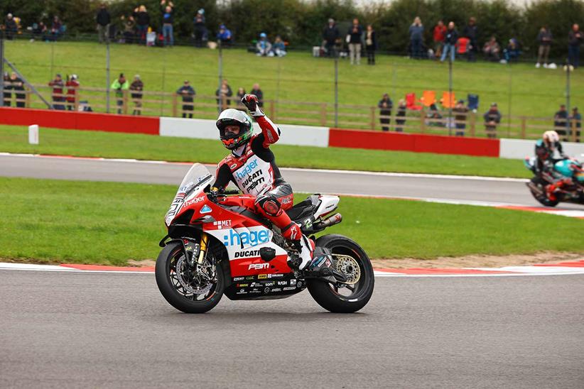 Glenn Irwin celebrates victory in Race Two at Donington Park