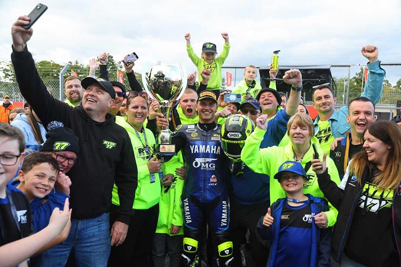 Kyle Ryde celebrates with family and friends after winning race one at Donington Park