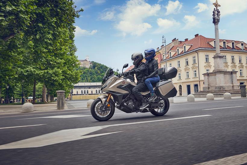 2025 Honda NT1100 tourer ridden with a pillion