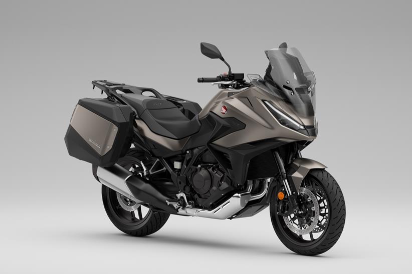 2025 Honda NT1100 tourer side view in a studio