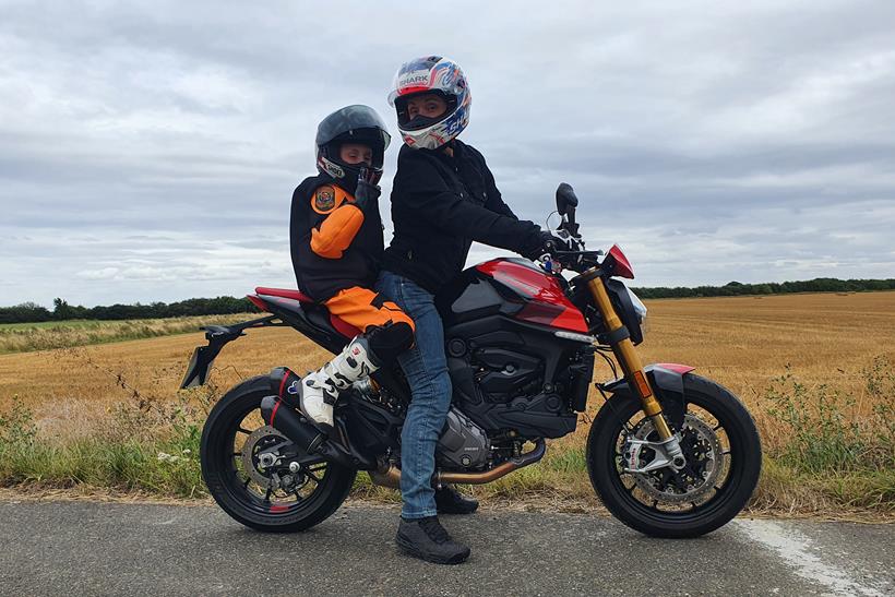 Ducati Monster SP with young pillion