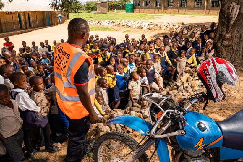 Riders for Health visiting a rural school