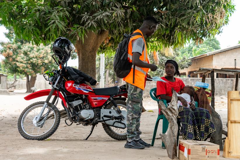 Riders for Health rider with Yamaha AG200