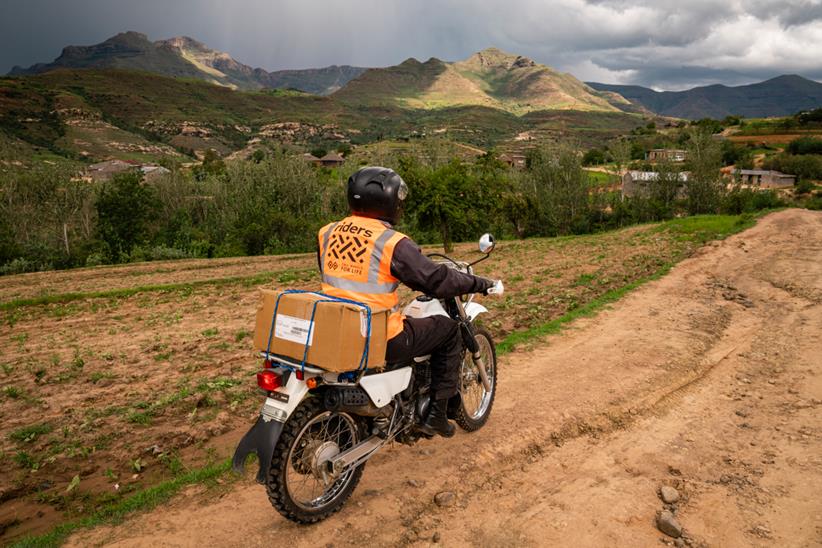 Riders for Health rider in rural Africa