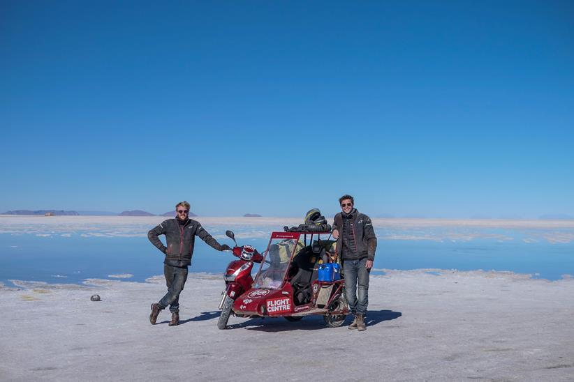 Scooter and sidecar on salt flats