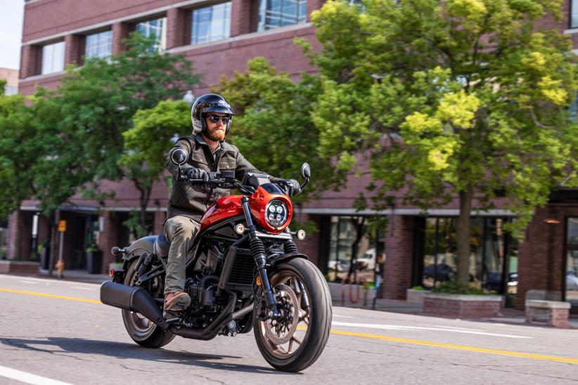 Honda CMX1100 SE cruiser riding through town