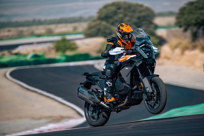 KTM 1390 Super Adventure S performing a wheelie