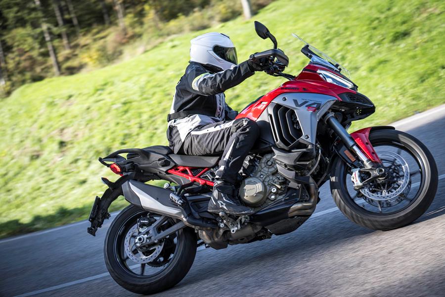 2025-on Ducati Multistrada V4S side shot leaning into a corner